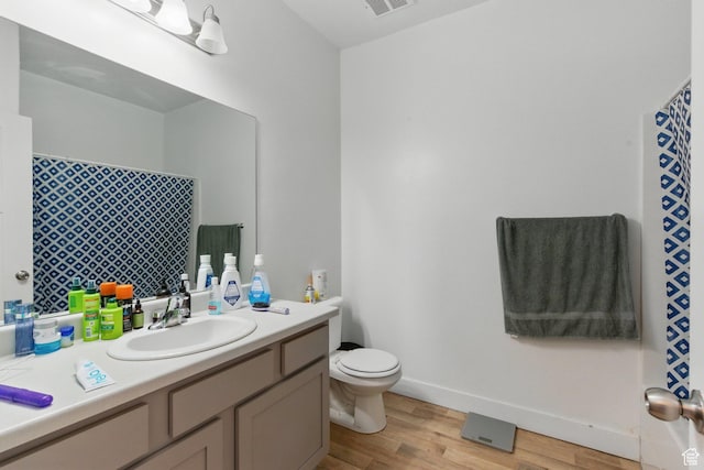 3647 W 1530 N Unit Hh204, Lehi, UT 84043 - full bath with vanity, wood finished floors, curtained shower, toilet, and baseboards