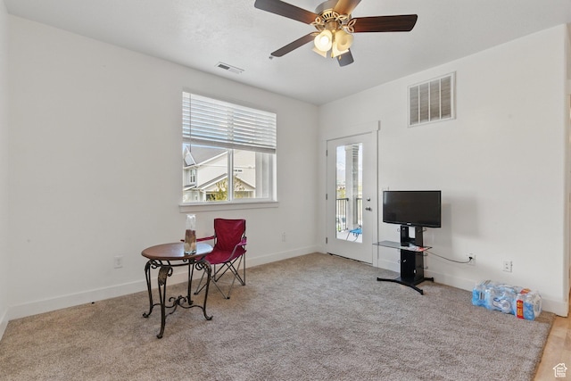 3647 W 1530 N Unit Hh204, Lehi, UT 84043 - living area with baseboards, a ceiling fan, carpet flooring, and visible vents