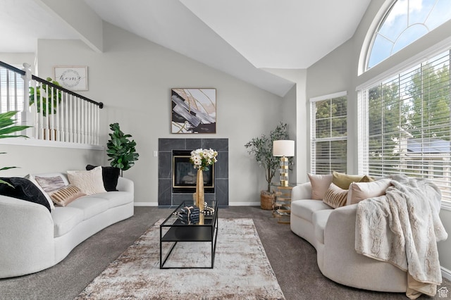 3559 W Lexington View Dr, West Jordan, UT 84088 - living room featuring carpet floors, baseboards, vaulted ceiling, and a fireplace