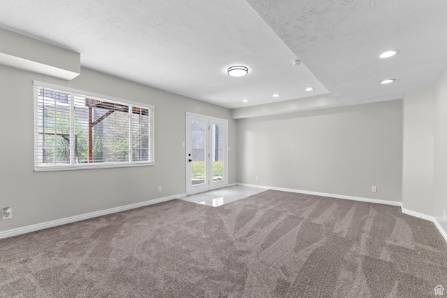 3559 W Lexington View Dr, West Jordan, UT 84088 - carpeted spare room featuring baseboards, recessed lighting, and a textured ceiling