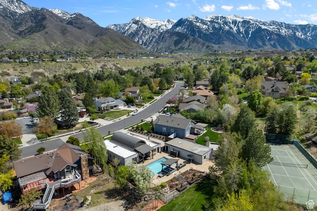 drone / aerial view with a residential view and a mountain view