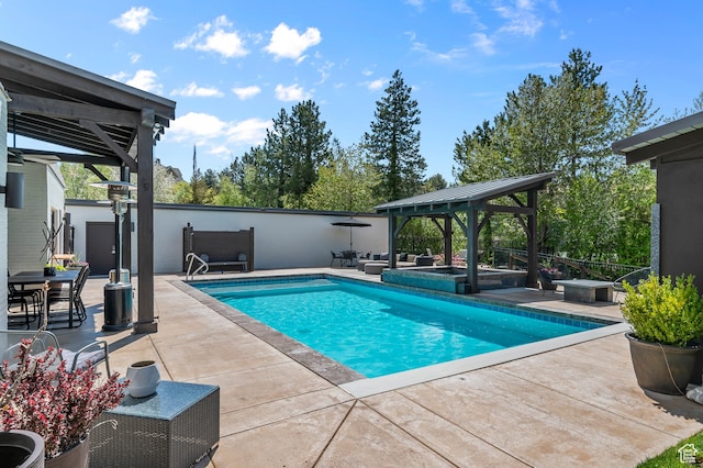 view of pool featuring a gazebo, a patio area, and a fenced in pool