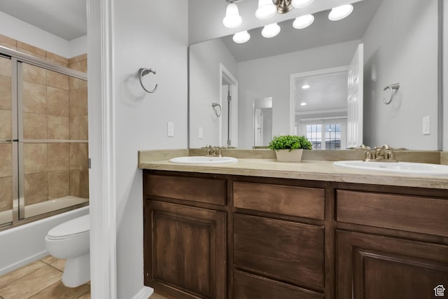 2693 W 2400 N, Lehi, UT 84043 - bathroom with double vanity, toilet, enclosed tub / shower combo, and a sink