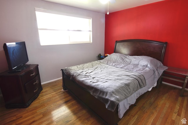 3223 S Fairlane St, Magna, UT 84044 - bedroom with baseboards and wood finished floors