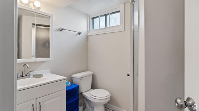 278 S 750 E, Clearfield, UT 84015 - bathroom featuring a shower with door, vanity, and toilet