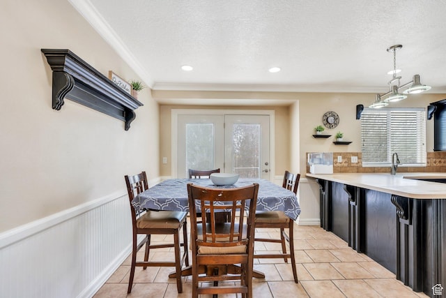 2363 W 960 N, Provo, UT 84601 - dining area with ornamental molding, a textured ceiling, light tile patterned flooring, and a healthy amount of sunlight