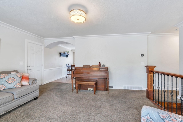 2363 W 960 N, Provo, UT 84601 - carpeted living room with visible vents, arched walkways, a textured ceiling, and crown molding