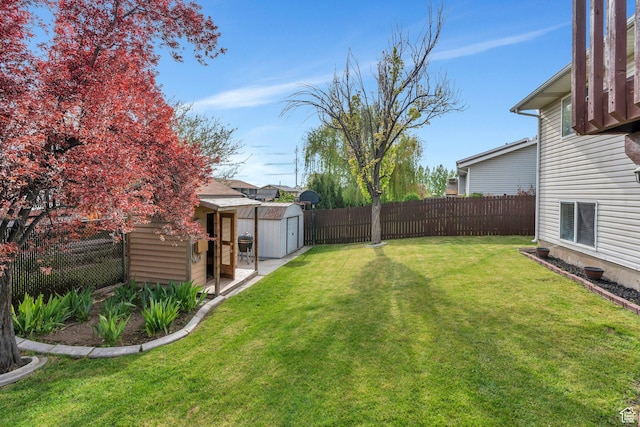 2363 W 960 N, Provo, UT 84601 - view of yard featuring a storage shed, an outdoor structure, and a fenced backyard