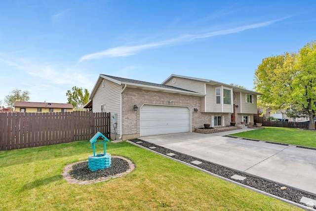 2363 W 960 N, Provo, UT 84601 - view of front of home with brick siding, a garage, fence, and concrete driveway