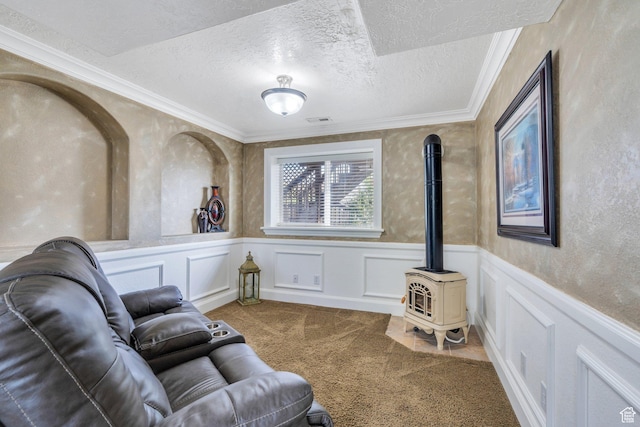 2363 W 960 N, Provo, UT 84601 - living area featuring carpet floors, a wood stove, wainscoting, ornamental molding, and a textured ceiling