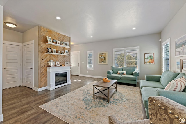 15176 S Battle Dr, Bluffdale, UT 84065 - living area featuring a glass covered fireplace, baseboards, recessed lighting, and dark wood-type flooring