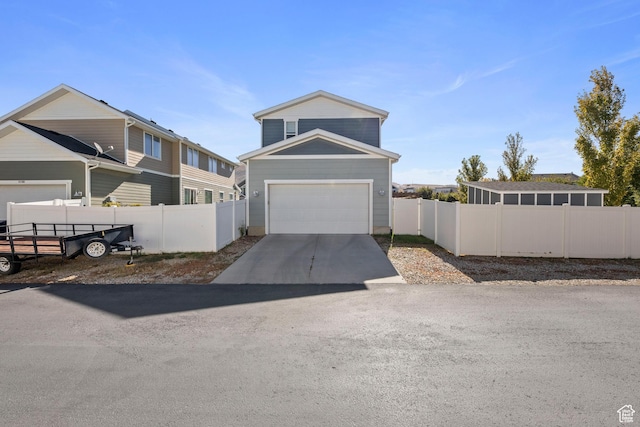15176 S Battle Dr, Bluffdale, UT 84065 - view of front of home with a garage, fence, and driveway