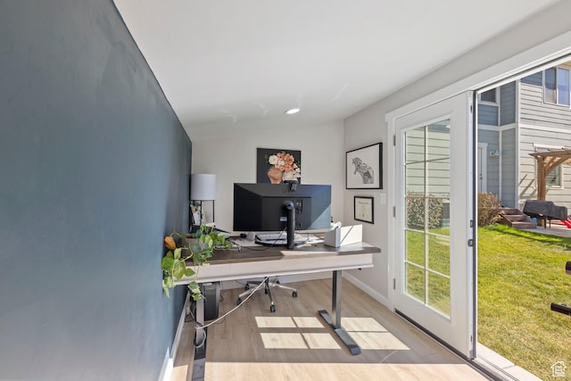 15176 S Battle Dr, Bluffdale, UT 84065 - home office featuring baseboards, a healthy amount of sunlight, and wood finished floors