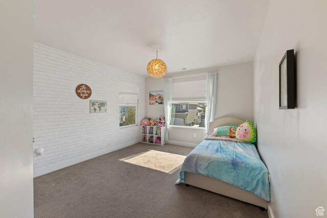 15176 S Battle Dr, Bluffdale, UT 84065 - bedroom with brick wall and carpet