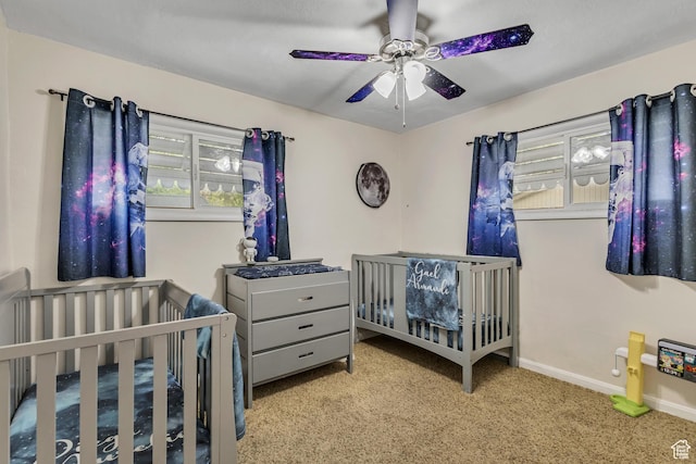 133 E 7th St S, Ogden, UT 84404 - carpeted bedroom with a nursery area, ceiling fan, and baseboards