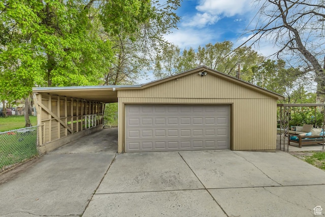 133 E 7th St S, Ogden, UT 84404 - garage with concrete driveway and fence