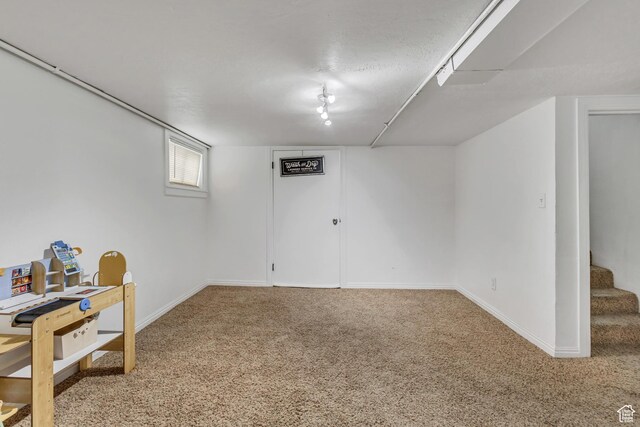 133 E 7th St S, Ogden, UT 84404 - below grade area with carpet floors, baseboards, and stairs