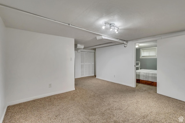 133 E 7th St S, Ogden, UT 84404 - finished basement featuring baseboards and carpet flooring