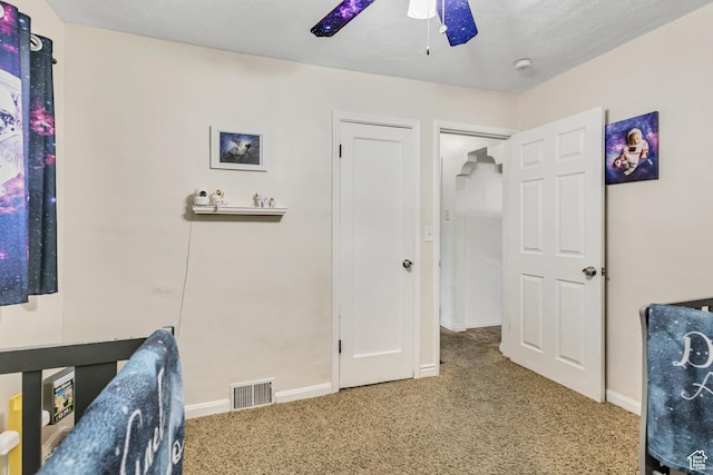 133 E 7th St S, Ogden, UT 84404 - carpeted bedroom with visible vents, a ceiling fan, and baseboards