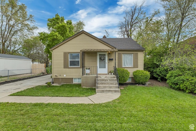133 E 7th St S, Ogden, UT 84404 - bungalow featuring fence and a front lawn