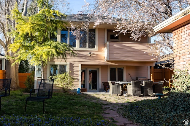 970 E Wilson Ave S, Salt Lake City, UT 84105 - rear view of property with fence and outdoor dining area