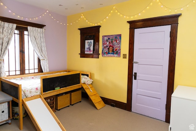 970 E Wilson Ave S, Salt Lake City, UT 84105 - carpeted bedroom featuring baseboards