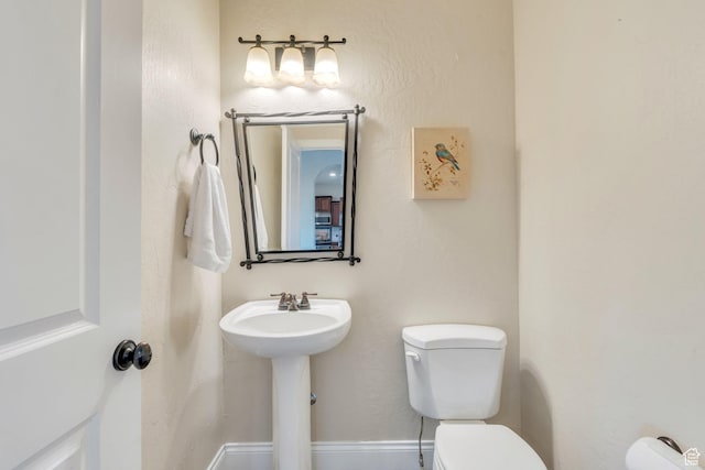 2797 W Fox Hunters Loop, Lehi, UT 84043 - half bathroom featuring a sink and toilet