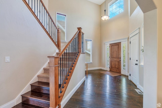 2797 W Fox Hunters Loop, Lehi, UT 84043 - entrance foyer featuring visible vents, hardwood / wood-style flooring, baseboards, a high ceiling, and stairs
