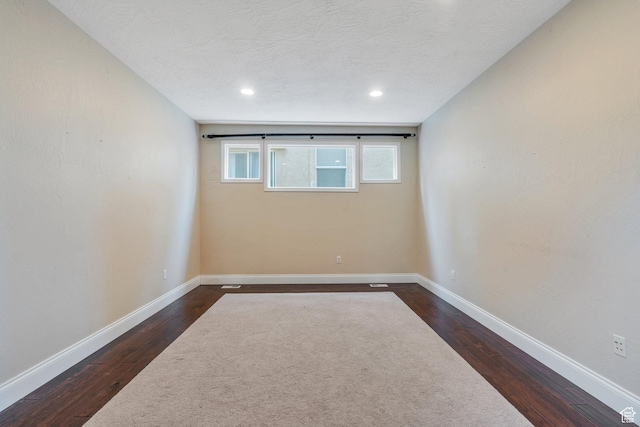 2797 W Fox Hunters Loop, Lehi, UT 84043 - spare room featuring recessed lighting, baseboards, and dark wood finished floors
