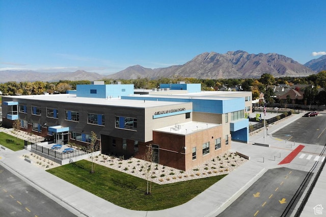246 E Wasatch Ave Unit 201, Midvale, UT 84070 - view of front of house featuring a mountain view