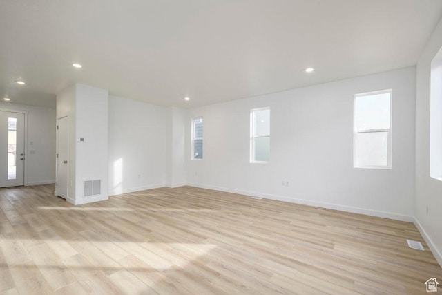 246 E Wasatch Ave Unit 201, Midvale, UT 84070 - unfurnished room featuring recessed lighting, baseboards, and light wood-type flooring