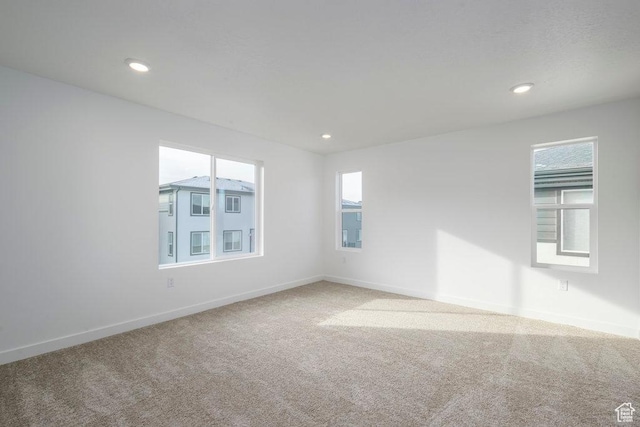246 E Wasatch Ave Unit 201, Midvale, UT 84070 - empty room featuring carpet, baseboards, and recessed lighting