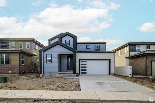 246 E Wasatch Ave Unit 201, Midvale, UT 84070 - view of front of house with driveway and fence