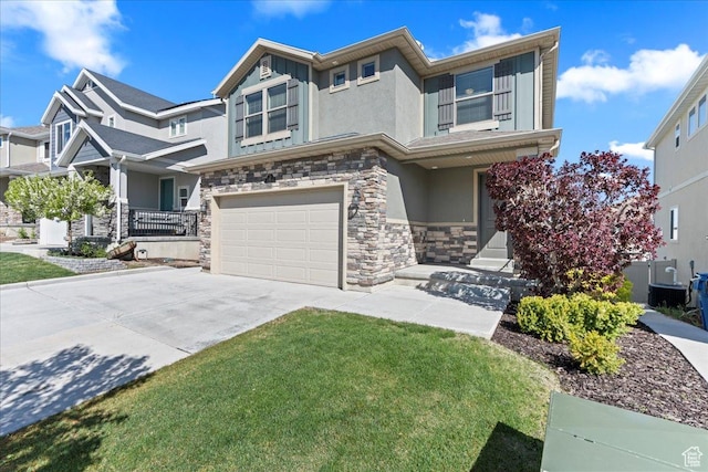 4264 W Abbey Bend Ln, Herriman, UT 84096 - view of front of property with stone siding, stucco siding, a garage, concrete driveway, and covered porch