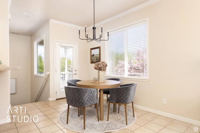 dining area featuring crown molding, baseboards, light tile patterned flooring, and a notable chandelier