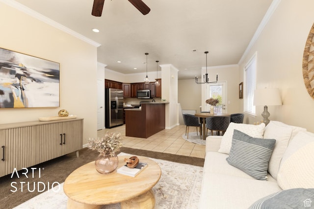 living room with crown molding, recessed lighting, light tile patterned floors, and ceiling fan with notable chandelier