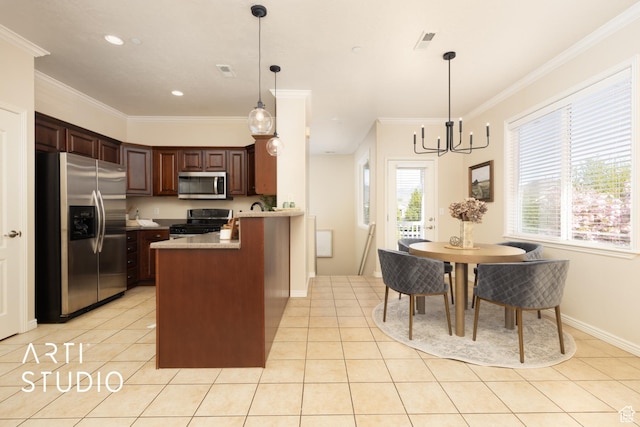 kitchen featuring visible vents, appliances with stainless steel finishes, light countertops, a peninsula, and light tile patterned flooring