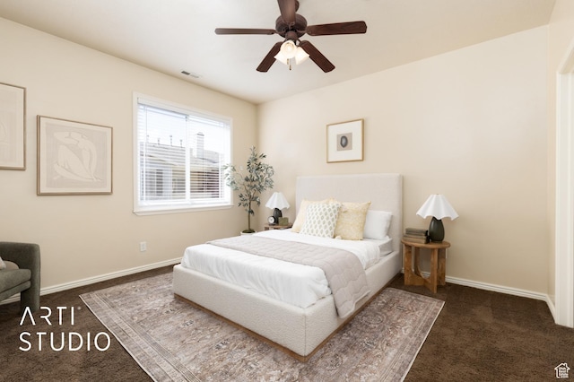 carpeted bedroom featuring baseboards, ceiling fan, and visible vents
