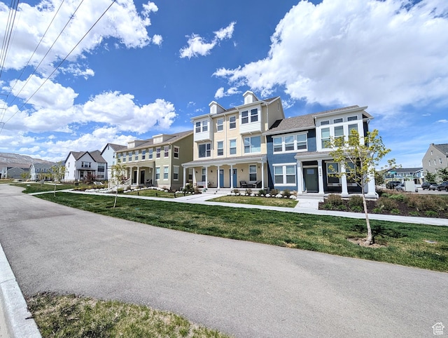 6688 W 11800 S, South Jordan, UT 84009 - view of front of home featuring a chimney, a front lawn, and a residential view