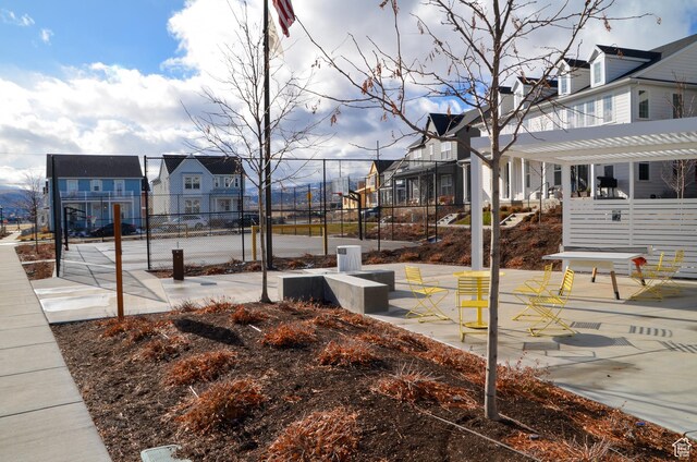 6688 W 11800 S, South Jordan, UT 84009 - view of community featuring a residential view, fence, and a pergola