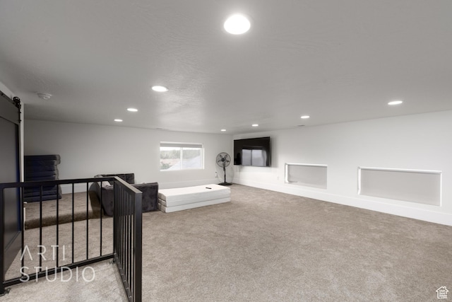 3658 W 2510 S, Hurricane, UT 84737 - exercise room featuring carpet, a barn door, baseboards, and recessed lighting