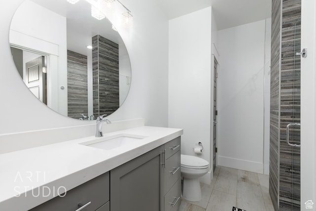 3658 W 2510 S, Hurricane, UT 84737 - bathroom featuring tile walls, toilet, a shower stall, and vanity