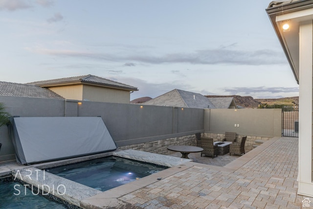 3658 W 2510 S, Hurricane, UT 84737 - view of pool featuring a patio area, an in ground hot tub, and a fenced backyard