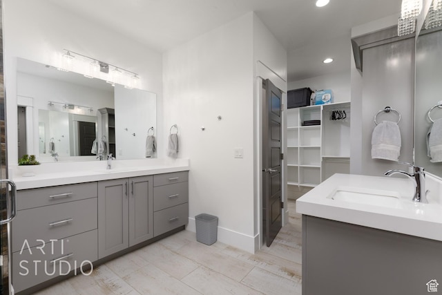 3658 W 2510 S, Hurricane, UT 84737 - full bathroom featuring vanity, a walk in closet, baseboards, and recessed lighting
