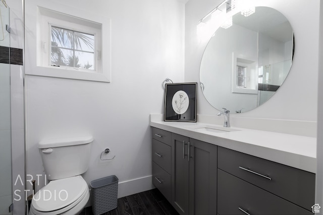 3658 W 2510 S, Hurricane, UT 84737 - bathroom with an enclosed shower, toilet, wood finished floors, and vanity