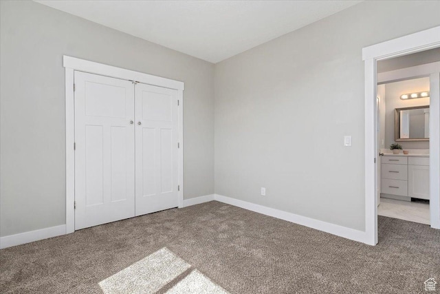 404 W 2700 S, Bountiful, UT 84010 - unfurnished bedroom with a closet, baseboards, and carpet floors