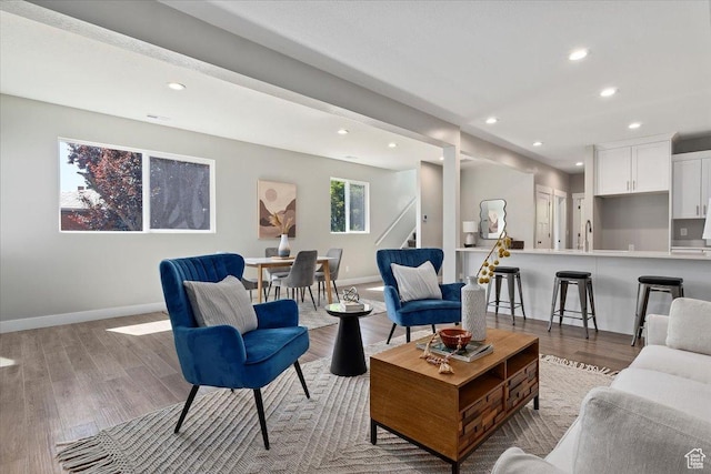 404 W 2700 S, Bountiful, UT 84010 - living area with baseboards, stairway, light wood finished floors, and recessed lighting