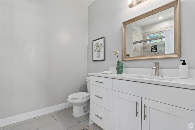 404 W 2700 S, Bountiful, UT 84010 - full bath with a stall shower, toilet, baseboards, tile patterned flooring, and vanity
