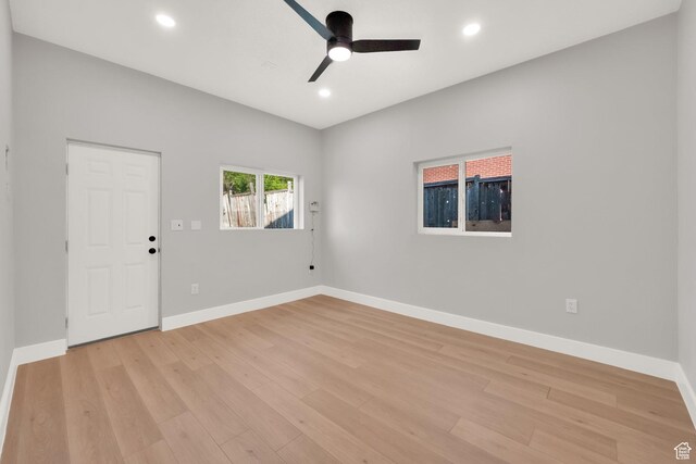 257 E Kingdon S, North Salt Lake, UT 84054 - spare room featuring a ceiling fan, baseboards, recessed lighting, and light wood-style flooring
