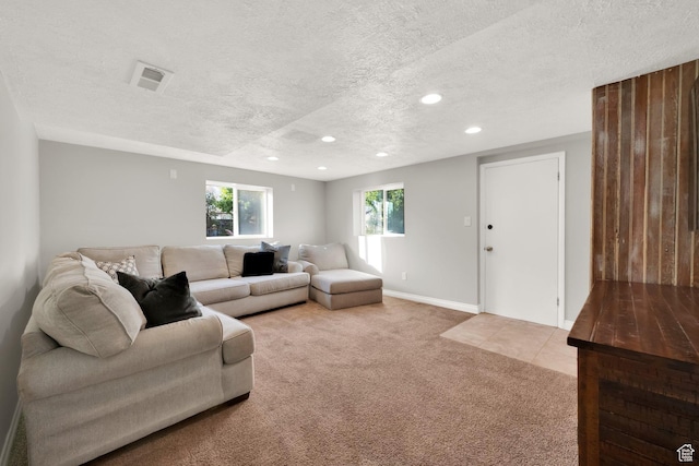 257 E Kingdon S, North Salt Lake, UT 84054 - living area featuring visible vents, recessed lighting, a textured ceiling, and light colored carpet